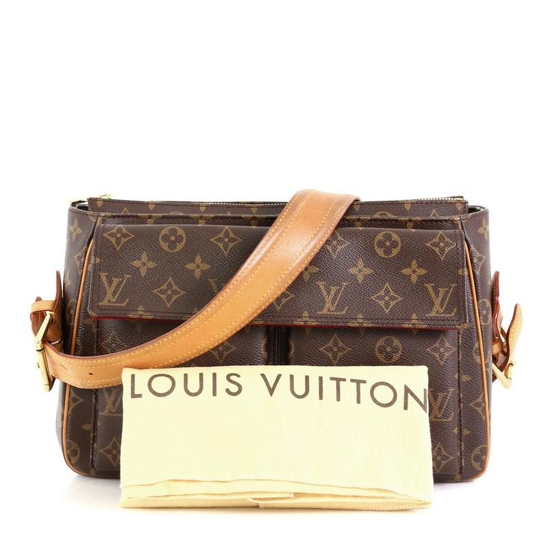 This Louis Vuitton Viva Cite Handbag Monogram Canvas GM, crafted in brown monogram coated canvas, features a single vachetta leather strap, two exterior flap pockets with dual magnetic snap closures, and gold-tone hardware. Its top zip closure opens