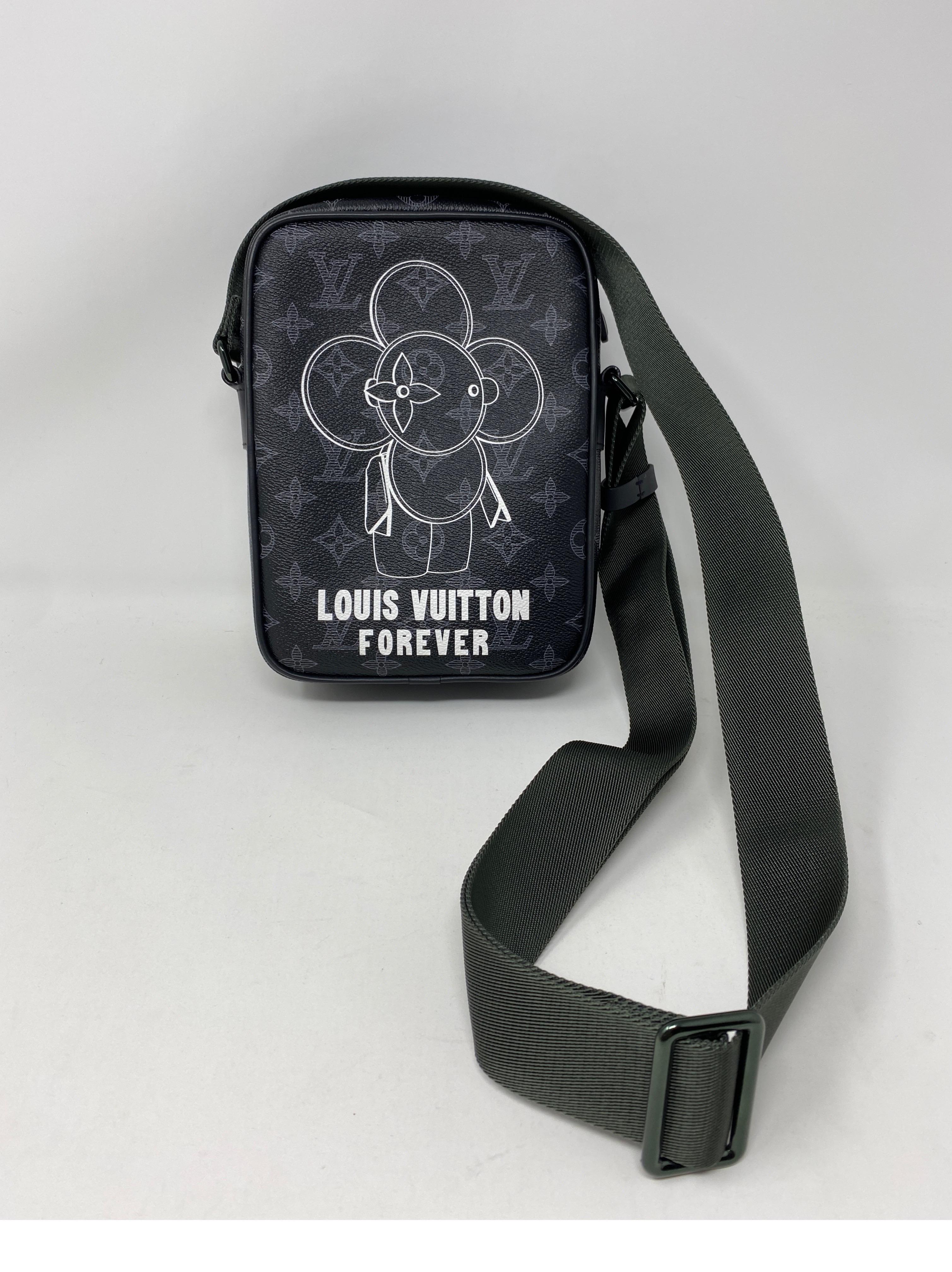 Louis Vuitton Vivienne Danube Crossbody Bag. Black monogram eclipse pattern. Rare and limited collector's piece. Mint like new condition. Guaranteed authentic. 