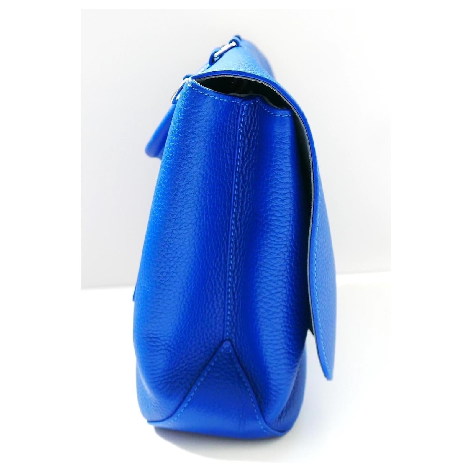 Gorgeous Louis Vuitton Volta Top Handle Bag - unused with dustbag, sticker tag and care leaflet. Made from thick, bright blue grained Taurillon leather with palladium hardware. It has a super chic semi structure shape with leather coated LV clasp,