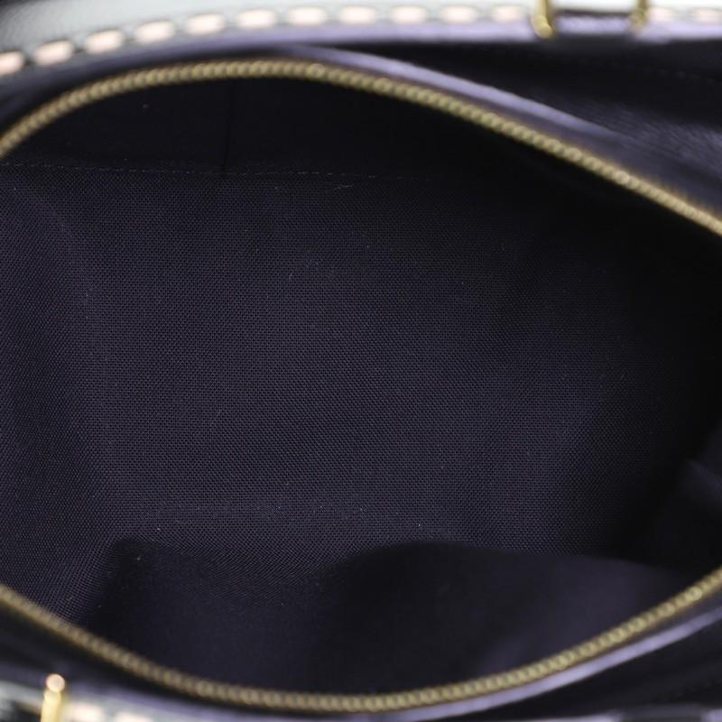 Women's or Men's Louis Vuitton Vosges Handbag Whipstitch Monogram Empreinte Leather MM