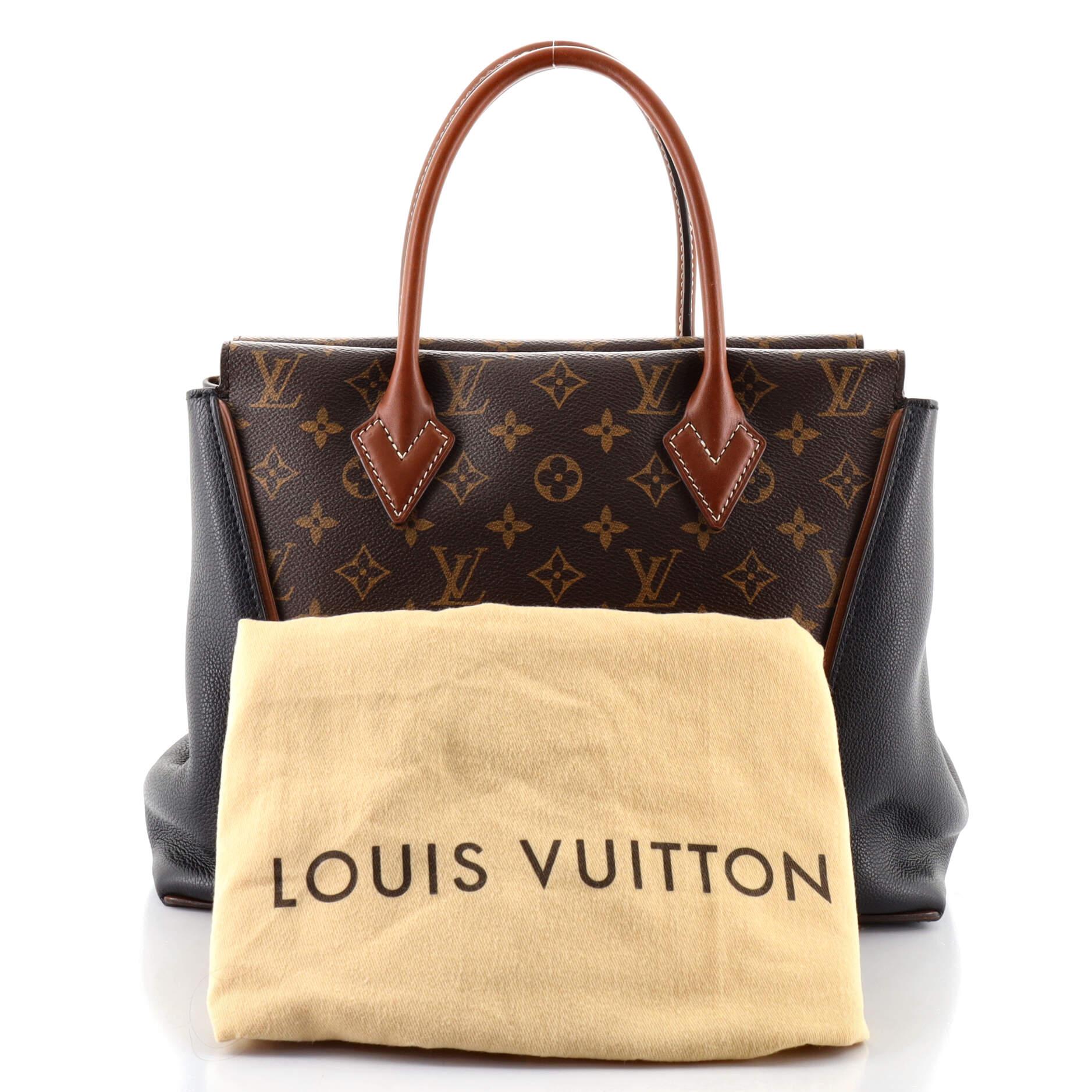 Condition: Good. Odor in interior. Creasing near base, darkening, scuffs and wear on leather trims and handles, stains on handles. Melting, indentations and splitting on handle wax edges, cracking on side opening wax edges, darkening and wear in