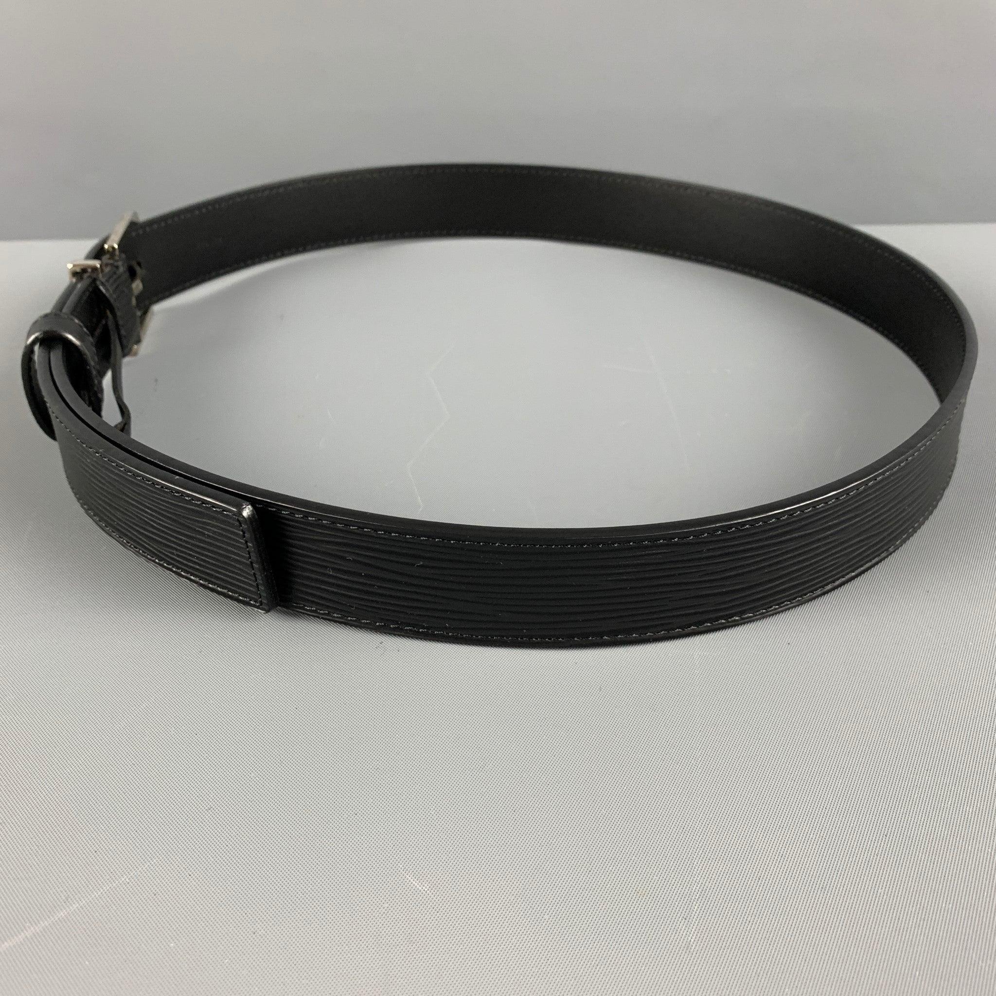 LOUIS VUITTON belt comes in a black EPI leather featuring a silver tone buckle. Made in France.Excellent Pre-Owned Condition.  

Marked:   CT 3113Length: 38.5 inches Width: 1.25 inches Fits: 32.5 inches  - 36 inches Buckle: 1.5 inches 
 
  
 