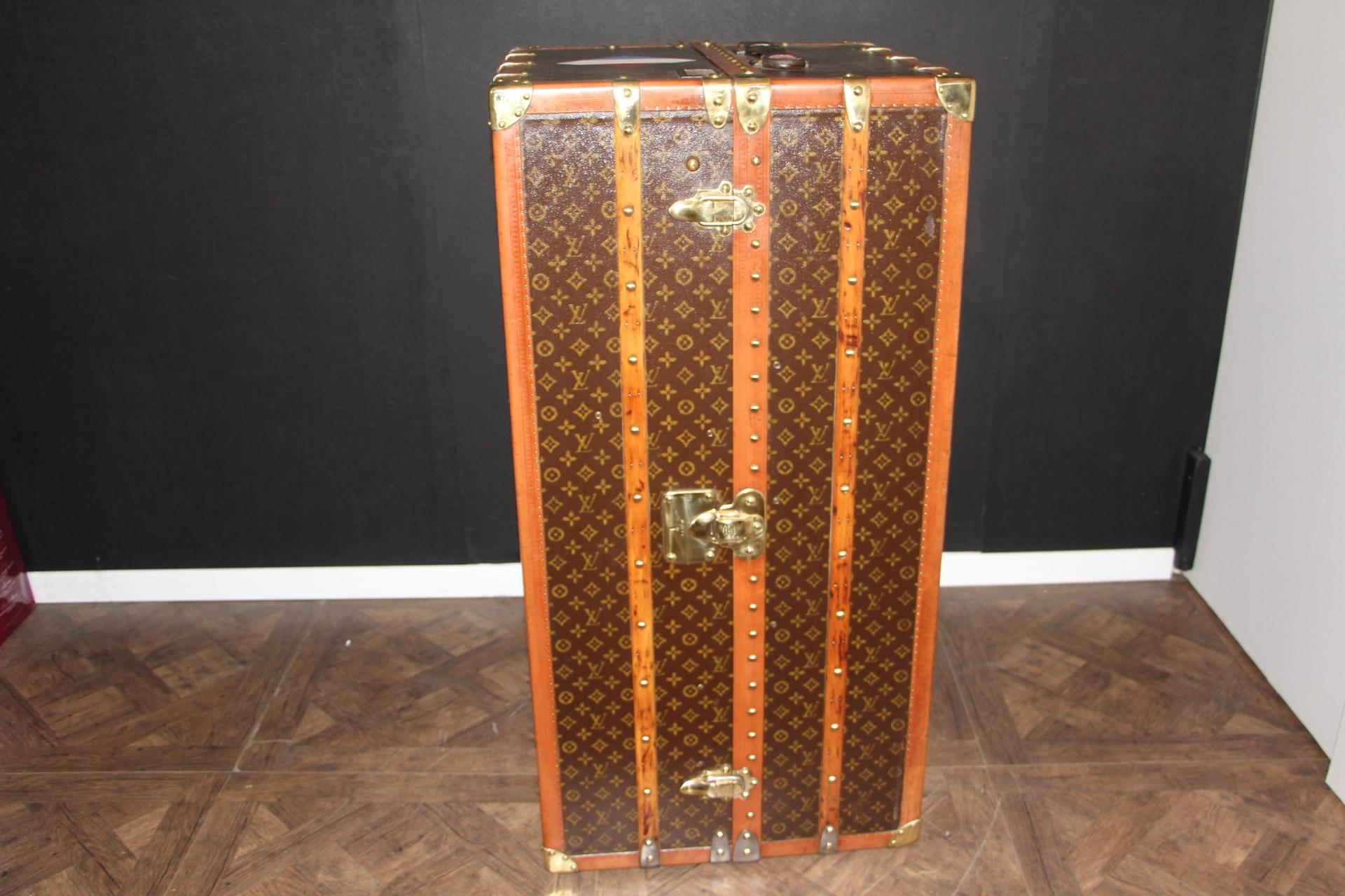 This impressive Louis Vuitton wardrobe features stenciled monogram canvas, lozine trims and solid brass locks.
Locks and studs are all marked Louis Vuitton. Customised painted french flag on the top.
Its interior is complete with a lot of original