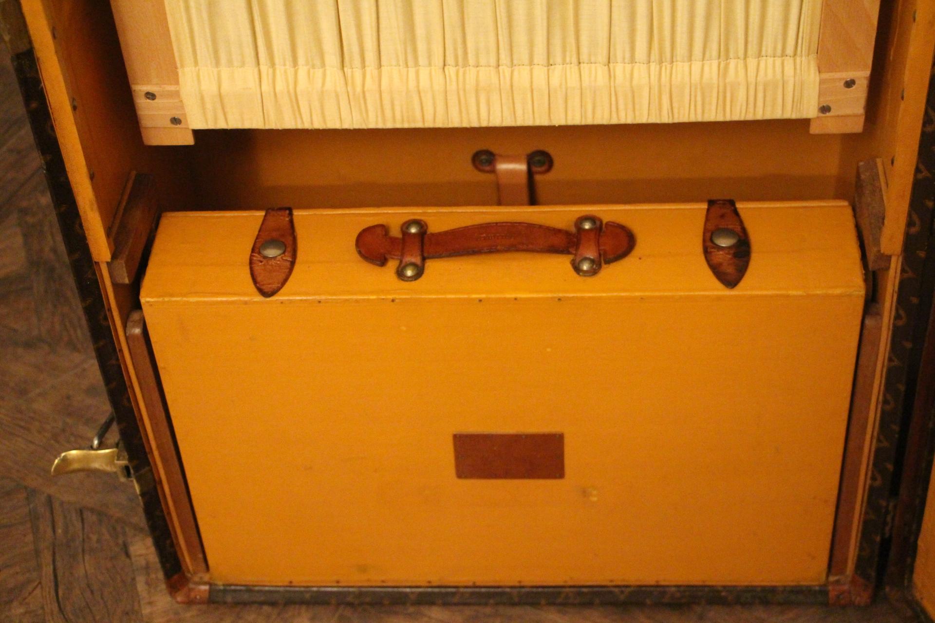 This impressive Louis Vuitton wardrobe features stenciled monogram canvas, lozine trims and solid brass locks.
Locks and studs are all marked Louis Vuitton. Customised painted french flag on the top.
Its interior is complete with a lot of original