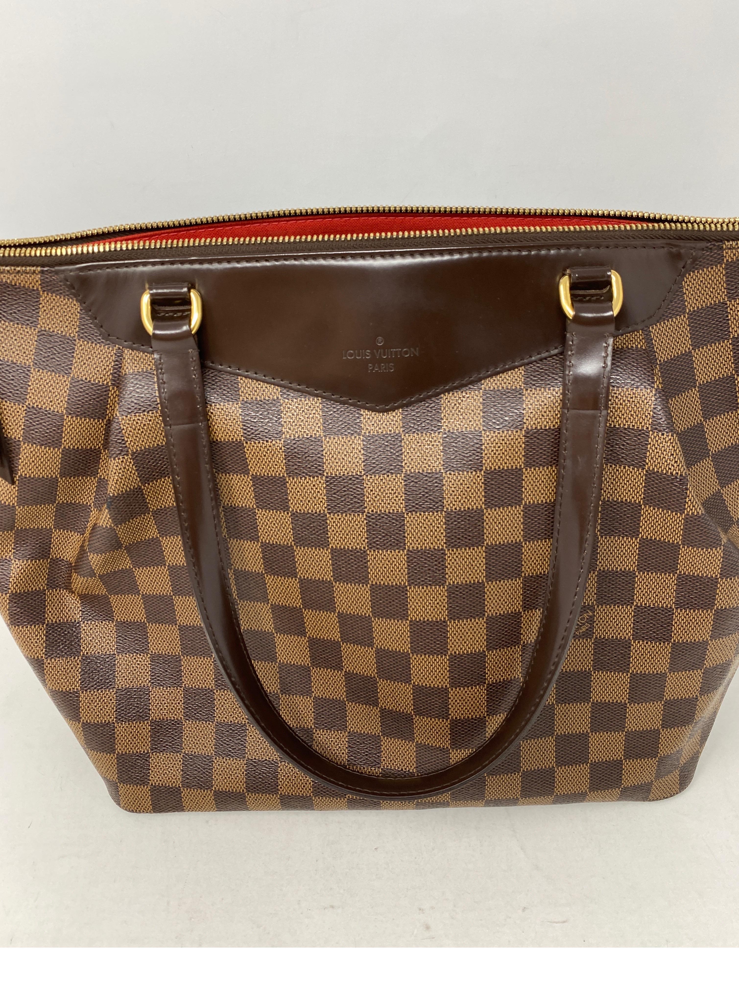 Louis Vuitton Westminster GM Damier Ebene Bag. Excellent like new condition. Red inerior. Clean. Retired style. Great classic bag. 