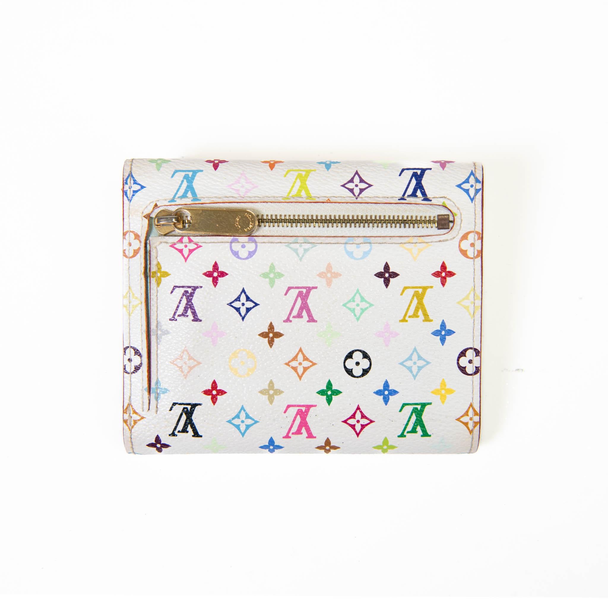 100% Authentic 

This is square multicolor wallet is an inspiration between Louis Vuitton and Japanese Pop artist Takashi Murakami. The wallet is crafted of multicolore monogram coated canvas in 33 colors on white toile canvas. It has a front flap