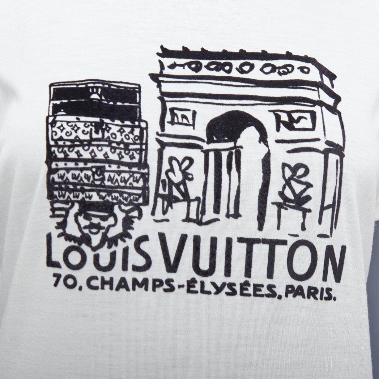 LOUIS VUITTON - Tshirt bianca con stampa in feltro sull'Arco di Trionfo  S
Riferimento: MECG/A00062
Marchio: Louis Vuitton
Materiale: Viscosa, seta
Colore: Crema, Nero
Modello: Tinta unita
Chiusura: Slip On
Dettagli extra: Maniche con