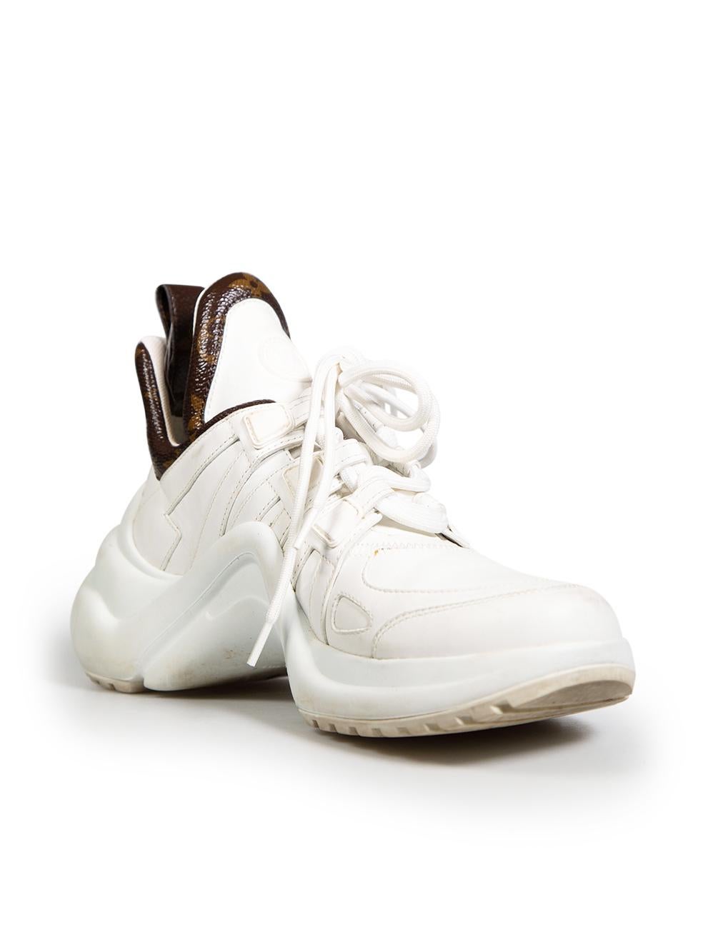 CONDITION is Very good. Minimal wear to trainers is evident. Minimal wear to tips, light scratches on midsoles. General wear to the upper of both shoes and light stain on upper near laces on the right shoe on this used Louis Vuitton designer resale