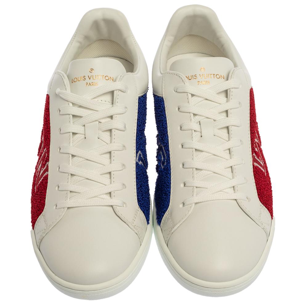 These Louis Vuitton sneakers for men come from their Luxembourg collection and showcases the label's brilliant craftsmanship in shoemaking. Made from white leather, the trainers feature terry fabric panels accented with the brand's name and the