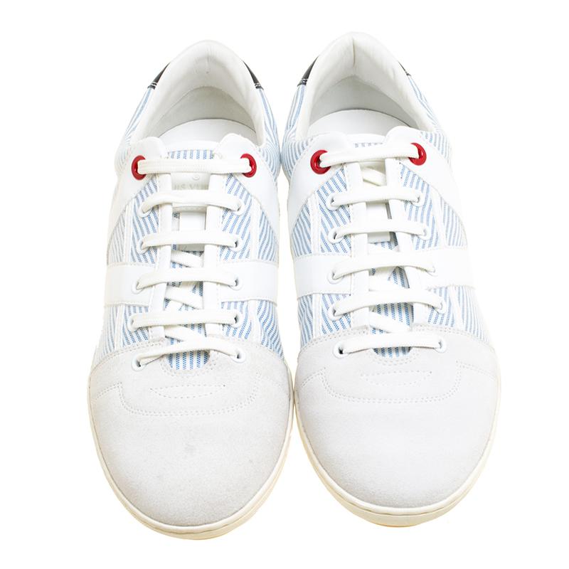 These sneakers from Louis Vuitton are truly a maker of trends. The sneakers are designed in a low-top profile using striped canvas and suede. FInished with lace-ups and the label on the rear, this pair is high in comfort and style, just perfect to