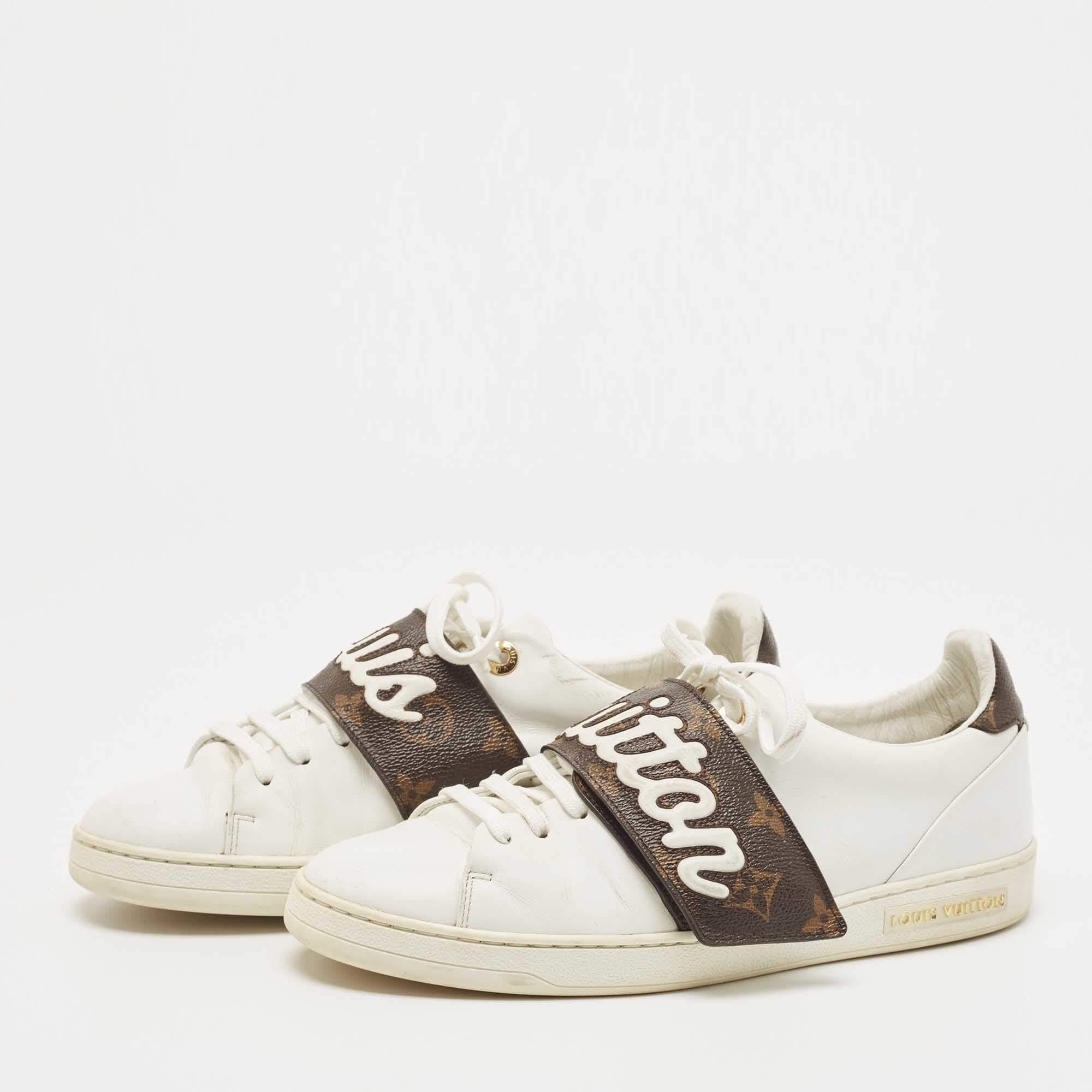 You'll love wearing these Frontrow sneakers from Louis Vuitton! The white sneakers are crafted from leather along with canvas and feature round toes along with gold-tone logo accents on the lace-up vamps as well as on the midsoles. They come