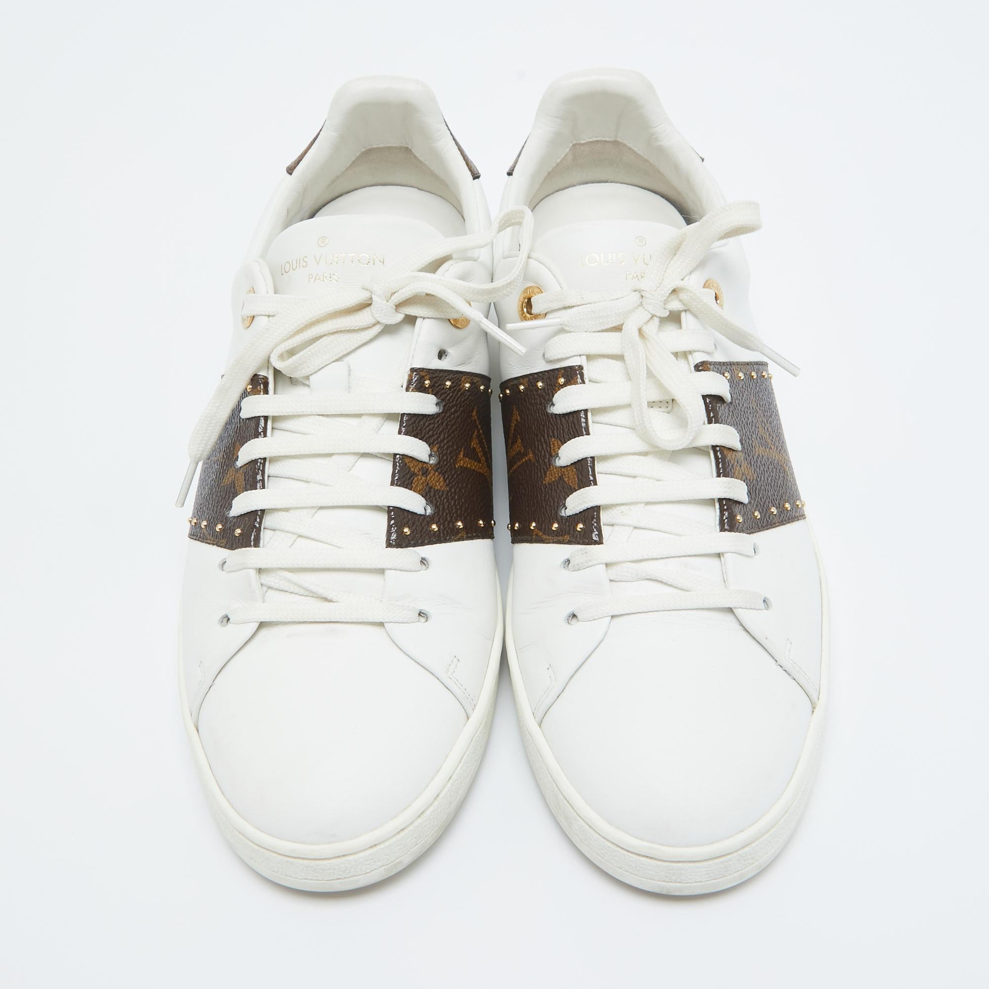 Give your outfit a luxe update with this pair of LV sneakers. The shoes are sewn perfectly to help you make a statement in them for a long time.

Includes: Original Box, Original Dustbag


