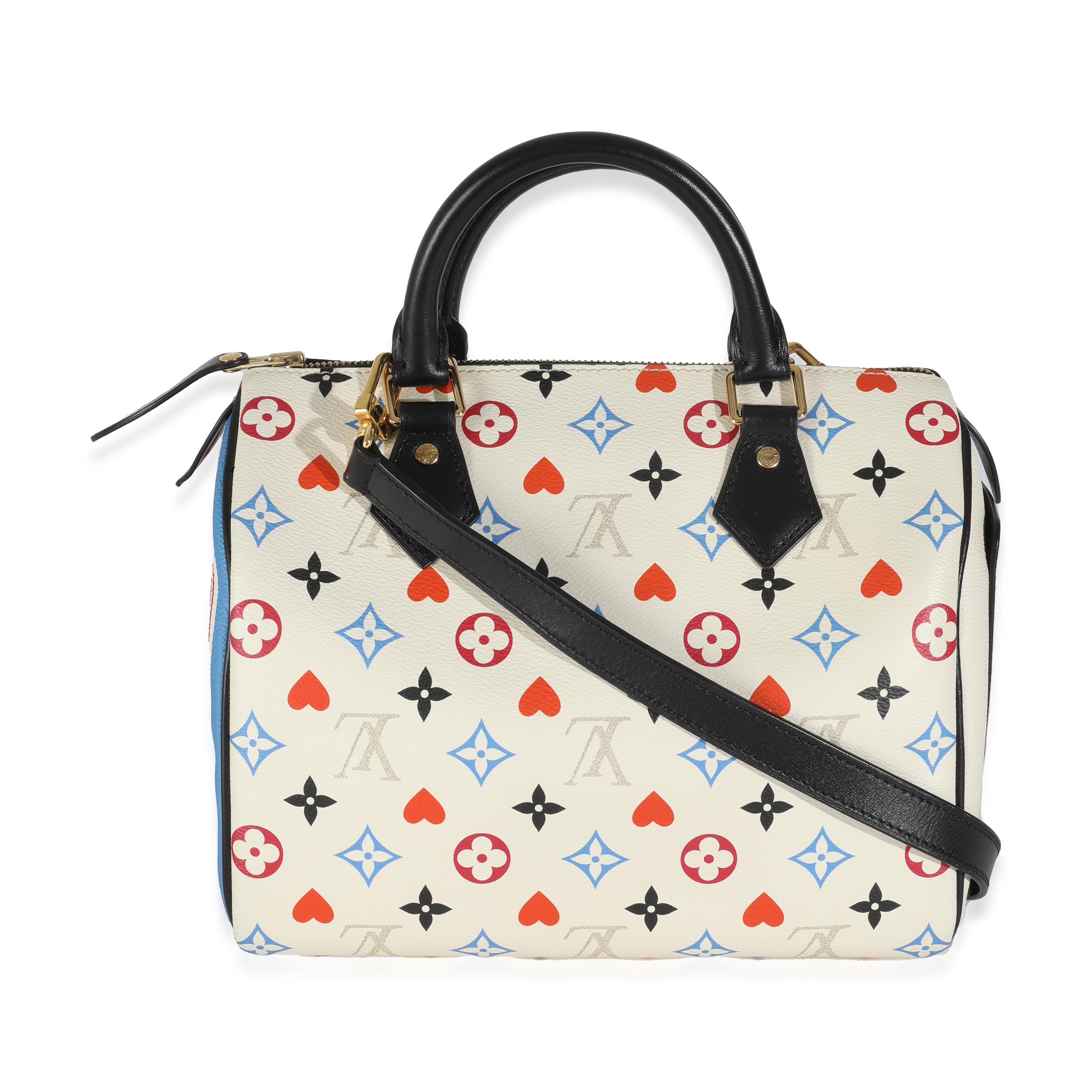 Listing Title: Louis Vuitton White Canvas Game On Speedy Bandouliere 25
SKU: 144493
Condition: Pre-owned 
Condition Description: Originally called the 'Express' bag, Louis Vuitton's Speedy bag is a style that has been around since 1930. The