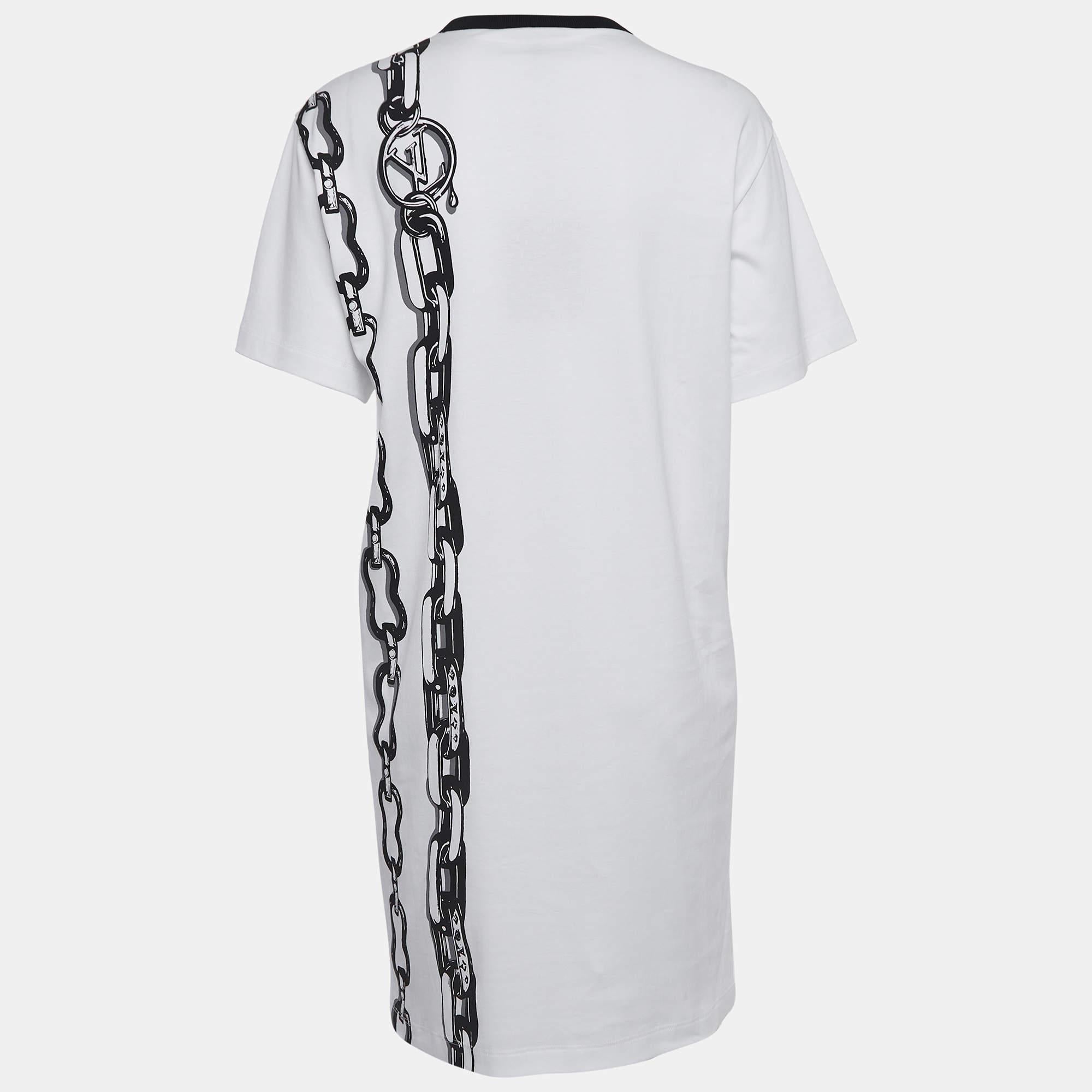 The Louis Vuitton t-shirt dress exudes casual luxury with its iconic monogram chain pattern. Crafted from premium cotton, it features a relaxed fit, short sleeves, and a mini length, blending comfort with high-end fashion for a chic and effortless