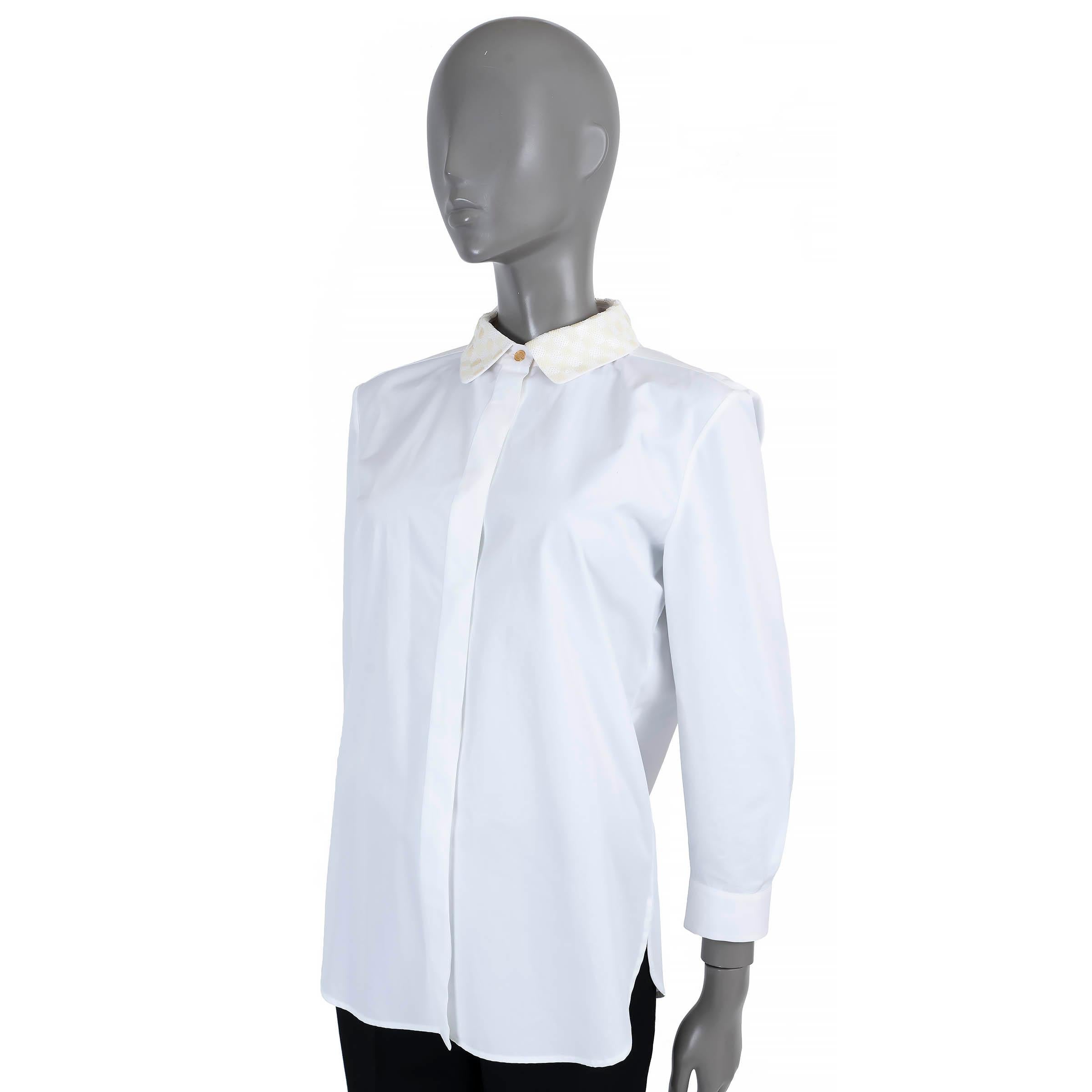 100% authentic Louis Vuitton button-down shirt in white cotton (73%), polyester (19%) and silk (8%). Features a boxy cut, and sequin embellished collar in white and ivory Damier pattern. Closes with concealed buttons on the front. Unlined. Has been