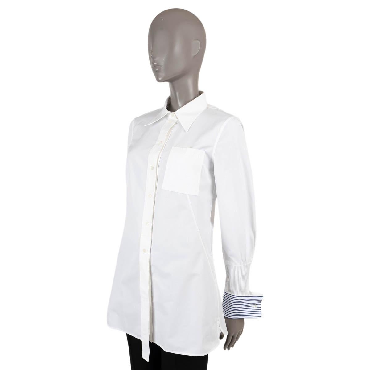 100% autentica casacca Louis Vuitton in cotone bianco (100%). Presenta polsini abbottonati a righe in blu e una tasca sul petto. Nuovo di zecca con etichetta.

Resort 2018  è stata presentata in passerella nella versione extra