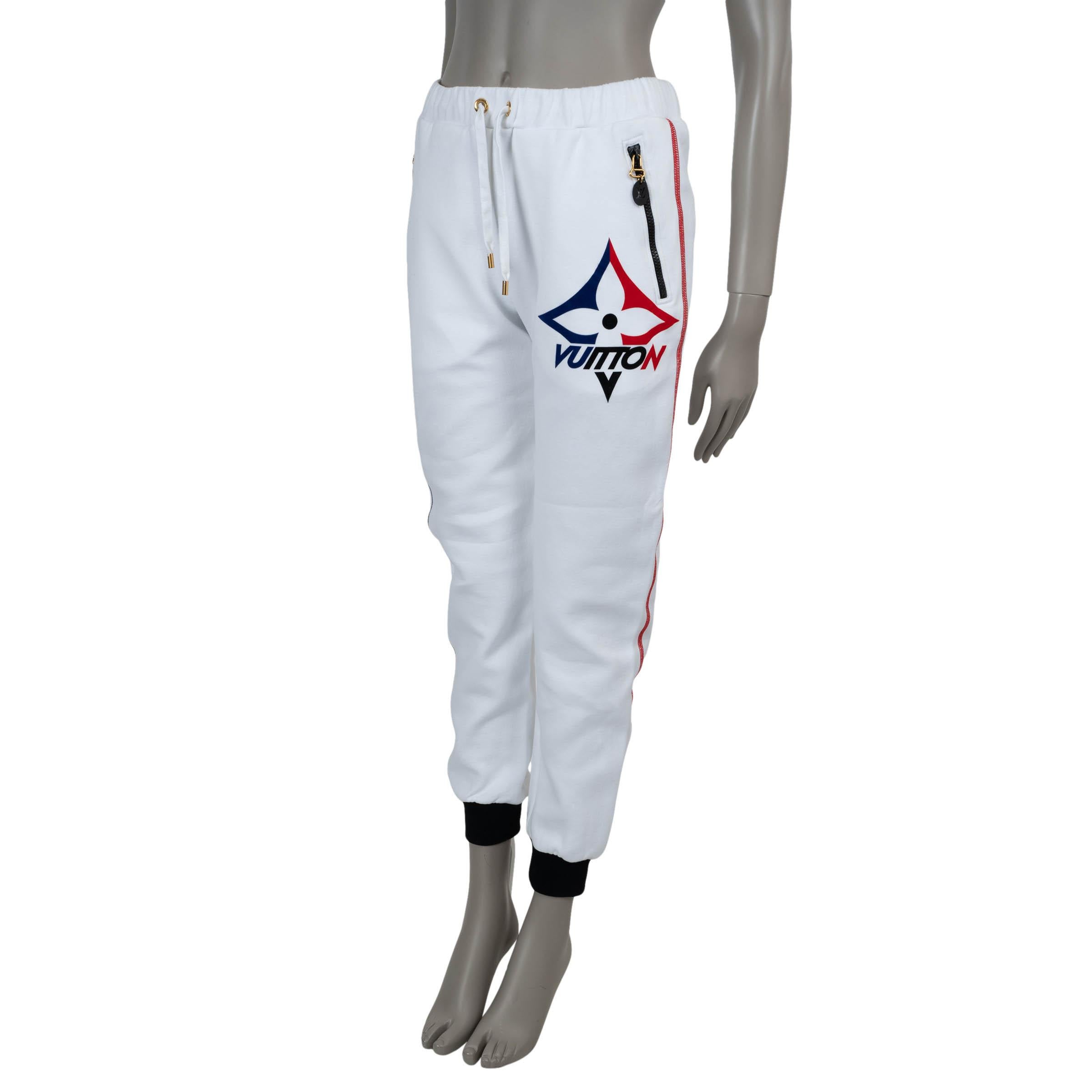 This 100% authentic Louis Vuitton jogging pants in white soft jersey cotton (89%) and polyamide (11%) offer a refined take on casual luxury. Designed with a classic fit, they feature contrasting black rib-knit cuffs for a sleek touch. Zipped side