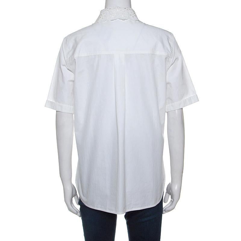 Stay subtle with this Louis Vuitton shirt that comes tailored from cotton. This one features an embroidered collar, a white hue, comfortable short sleeves and buttoned closure. It's a perfect piece for a day to night look.

