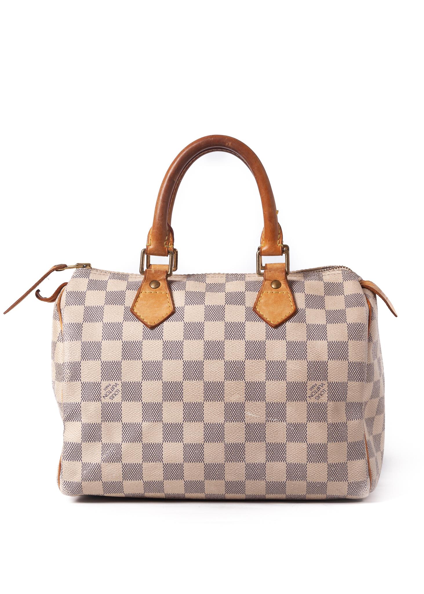 The smallest of the Speedy bags at 25cm and made popular by Audrey Hepburn. 
Made out of Damier Azur coated canvas with tanned natural cowhide leather finishes. This bag features rolled leather handles, brass hardware, top zip closure and beige