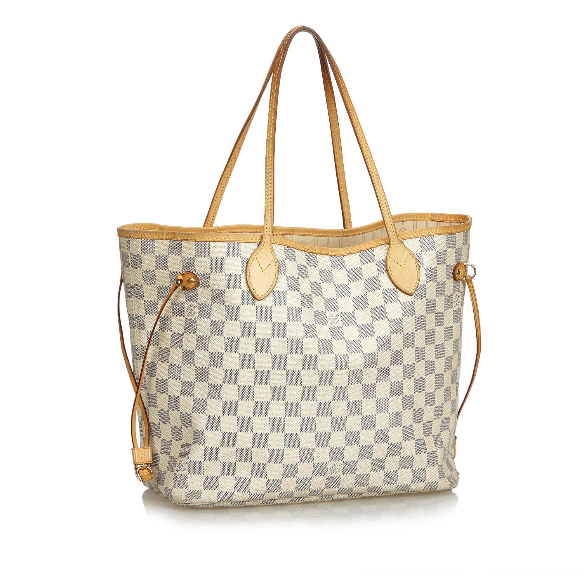 The Neverfull MM features the Damier Azur canvas, vachetta straps and trim, side drawstrings, an open top with a lobster claw clasp, and an interior zip pocket. It carries as B condition rating.

Inclusions: 
This item does not come with