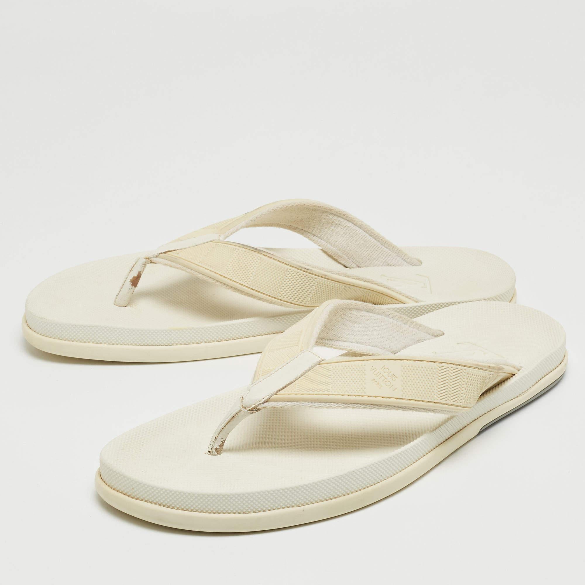 Louis Vuitton's flats for men are made of rubber and leather, with Damier detailing on the uppers. They're perfect for the beach, vacation days, or everyday use.

