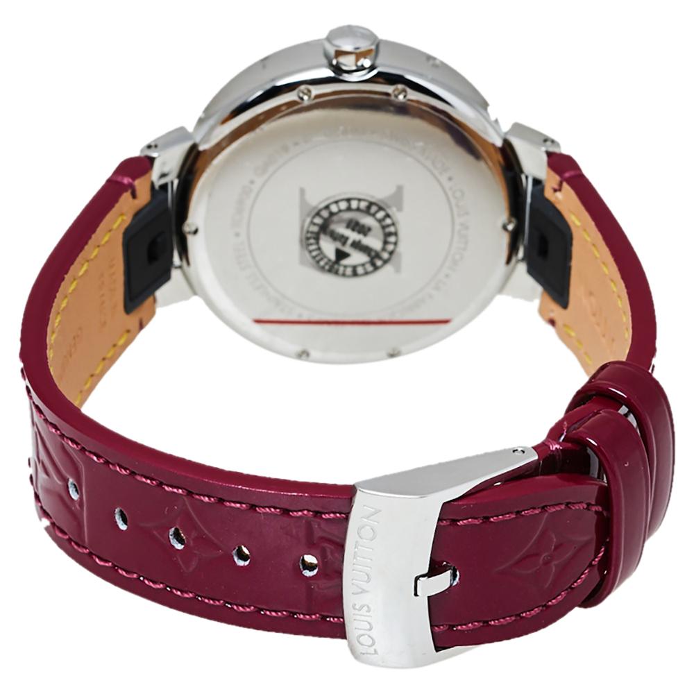 An eye-catching piece like this Louis Vuitton Tambour watch deserves a special place in your collection. It features a stainless steel case of 35 MM diameter that is fitted with a patent leather (Interchangeable) bracelet. It has a round dial