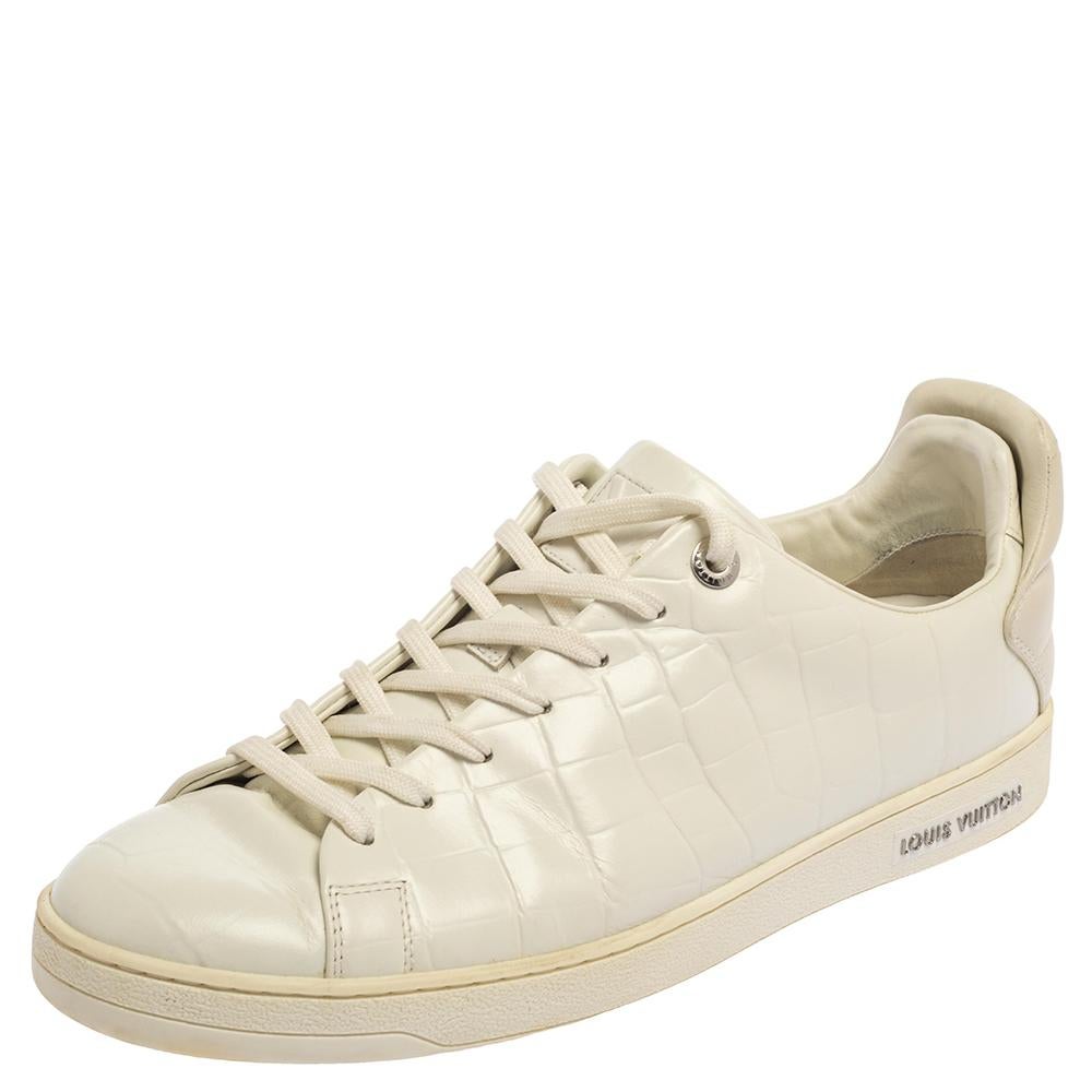 You'll love wearing these Frontrow sneakers from Louis Vuitton! The sneakers are crafted from croc-embossed leather and feature round toes and matching lace-ups on the vamps. They come equipped with comfortable leather-lined insoles and tough
