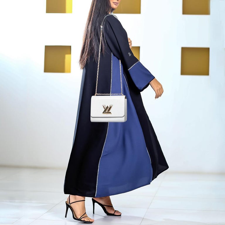 Louis Vuitton White/Black Epi Leather Aztec Twist MM Bag at 1stDibs