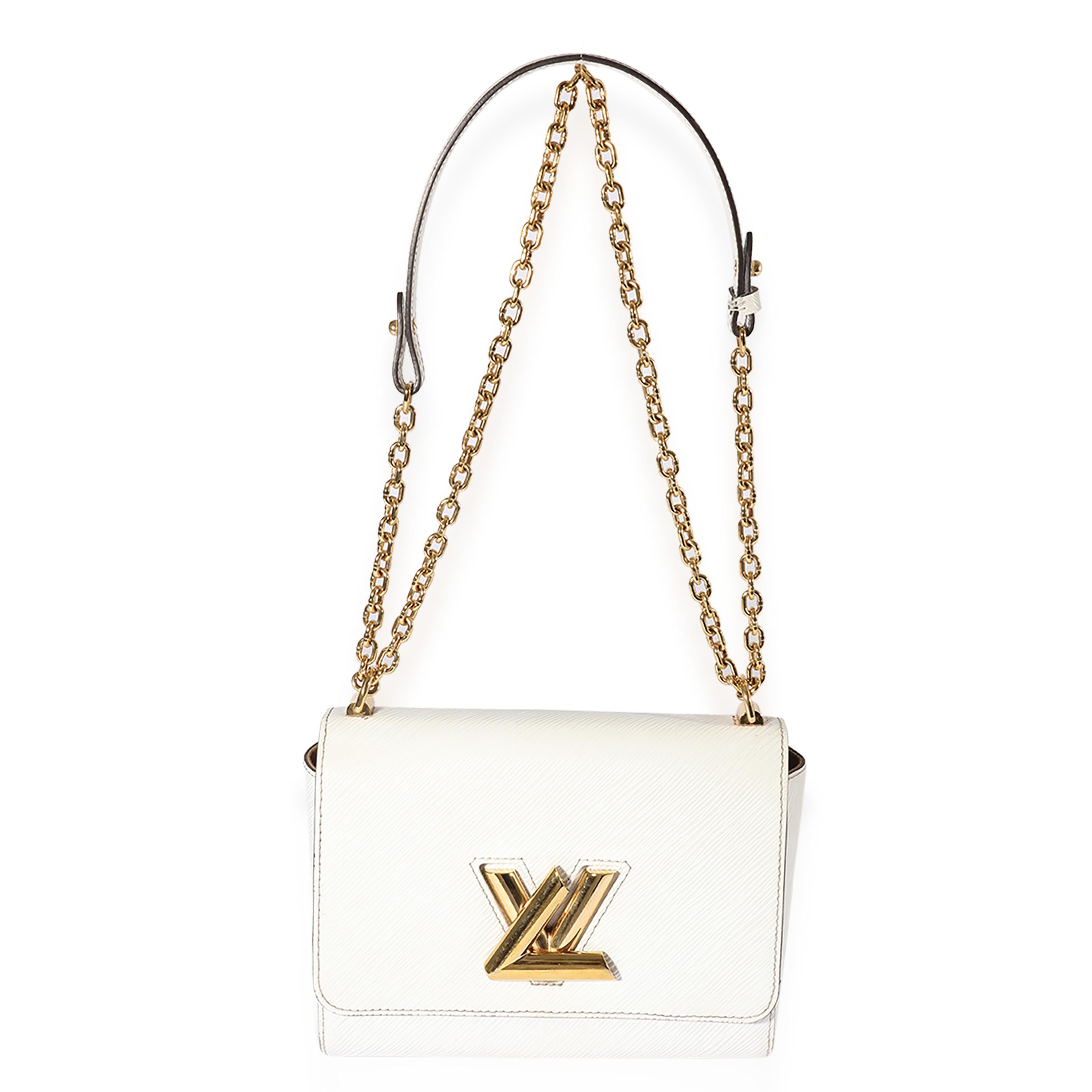 Listing Title: Louis Vuitton White Epi Twist MM
SKU: 122971
MSRP: 4700.00
Condition: Pre-owned 
Handbag Condition: Very Good
Condition Comments: Very Good Condition. Heavy scuffing and marks throughout exterior. Some discoloration. Scratching at