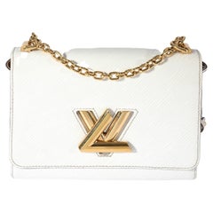 Louis Vuitton Black Epi Leather Twist MM Bag at 1stDibs