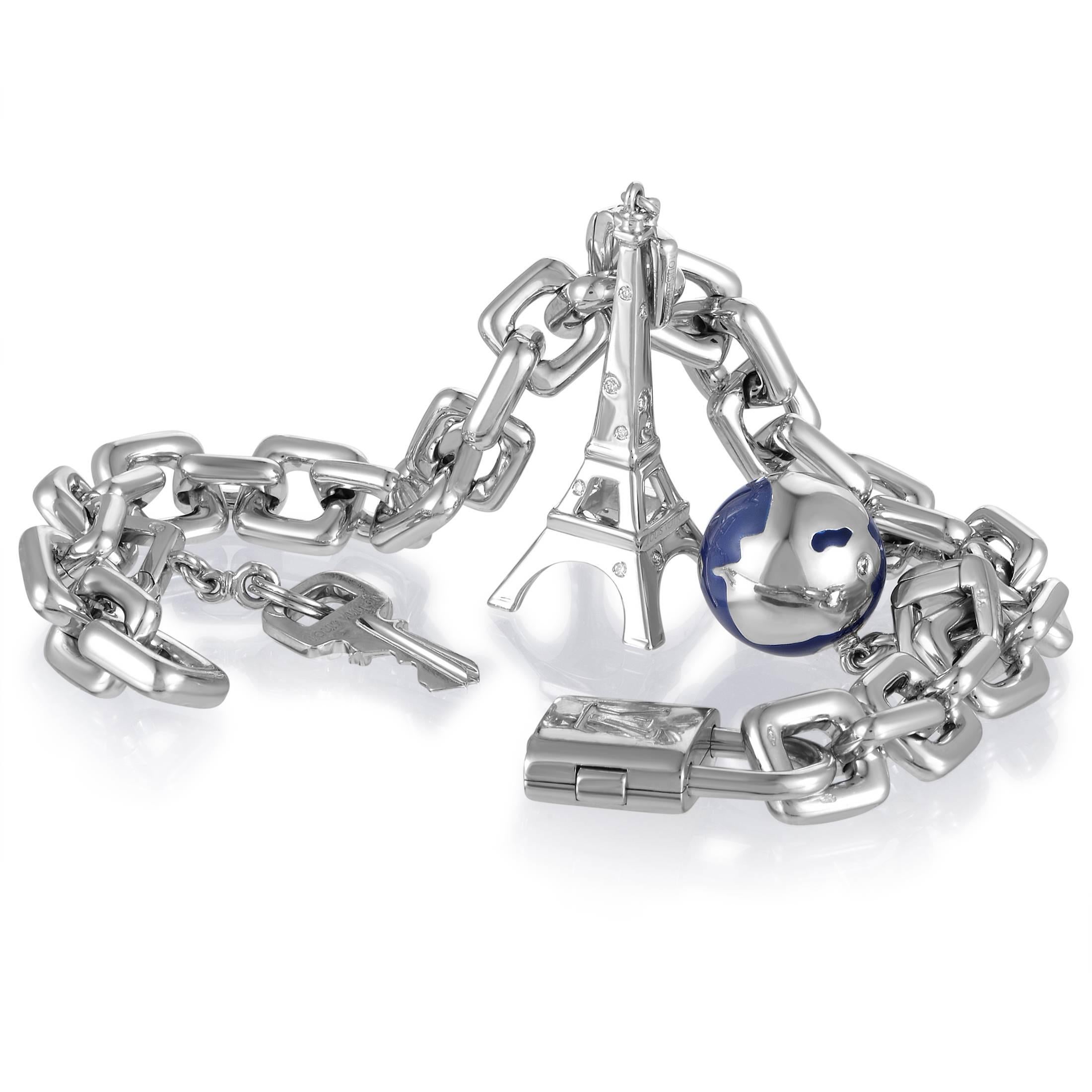 An adorable blend of marvelous charms including the Eiffel tower and nifty key is arranged along the splendidly gleaming chain made of precious 18K white gold in this exceptional bracelet from Louis Vuitton which boasts glittering diamonds and