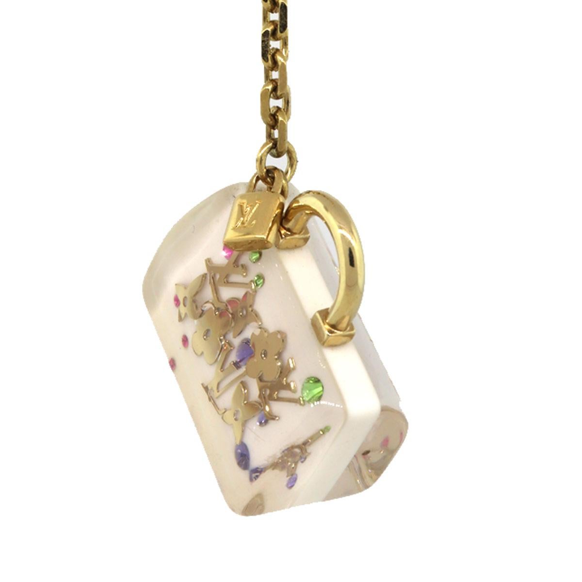 Company-Louis Vuitton
Model-White Inclusion Speedy Multi Color Handbag Charm Key Chain
Color-White
Date Code-N/A
Material-Clear resin featuring gold and multi-color
Measurements- Length: 1.5