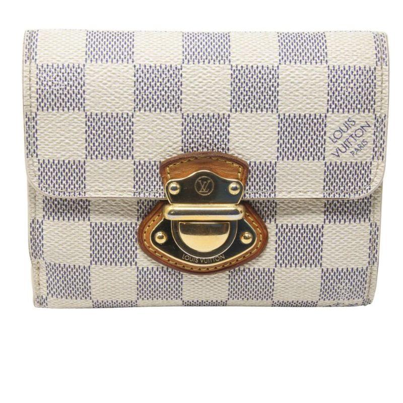 Louis Vuitton White Koala Damier Azur Coated Canvas French Compact Push-lock Wallet

The Louis Vuitton Damier Azur Canvas Koala Wallet is perfect if you're seeking something sleek and compact. With nine card slots, ID window and bill compartment, it