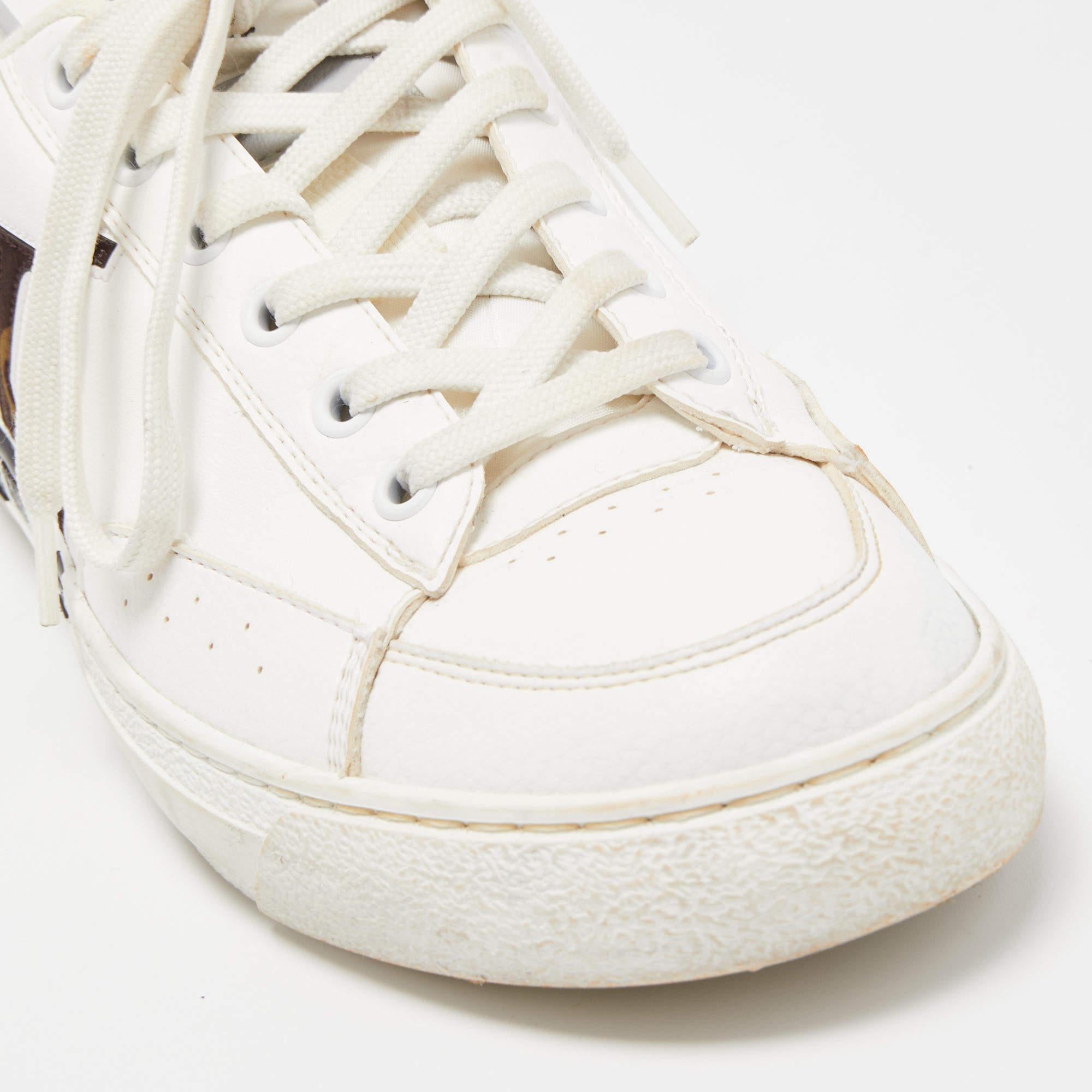 Coming in a classic silhouette, these designer sneakers are a seamless combination of luxury, comfort, and style. These sneakers are finished with signature details and comfortable insoles.

