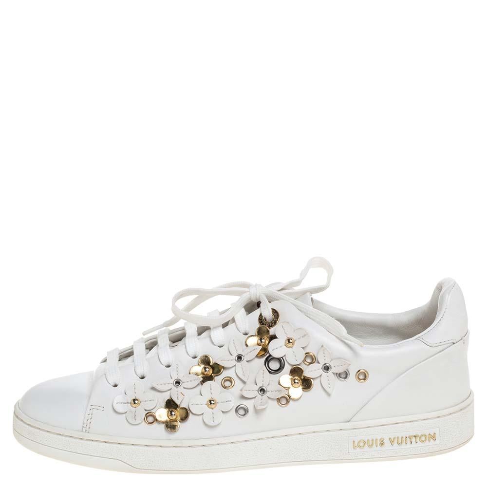 You'll love wearing these Frontrow sneakers from Louis Vuitton! The white sneakers are crafted from leather and feature round toes along with lace-up vamps and floral appliques on the quarters. They come equipped with the brand label on the