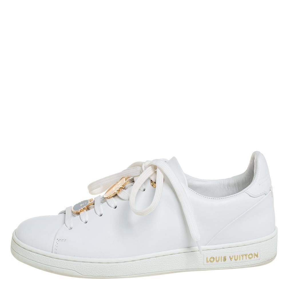 This pair of Frontrow sneakers from the House of Louis Vuitton brings a luxe update to the classic white sneakers. The design comes made from leather and is detailed with feline motifs on the lace-ups and the brand label in gold on the