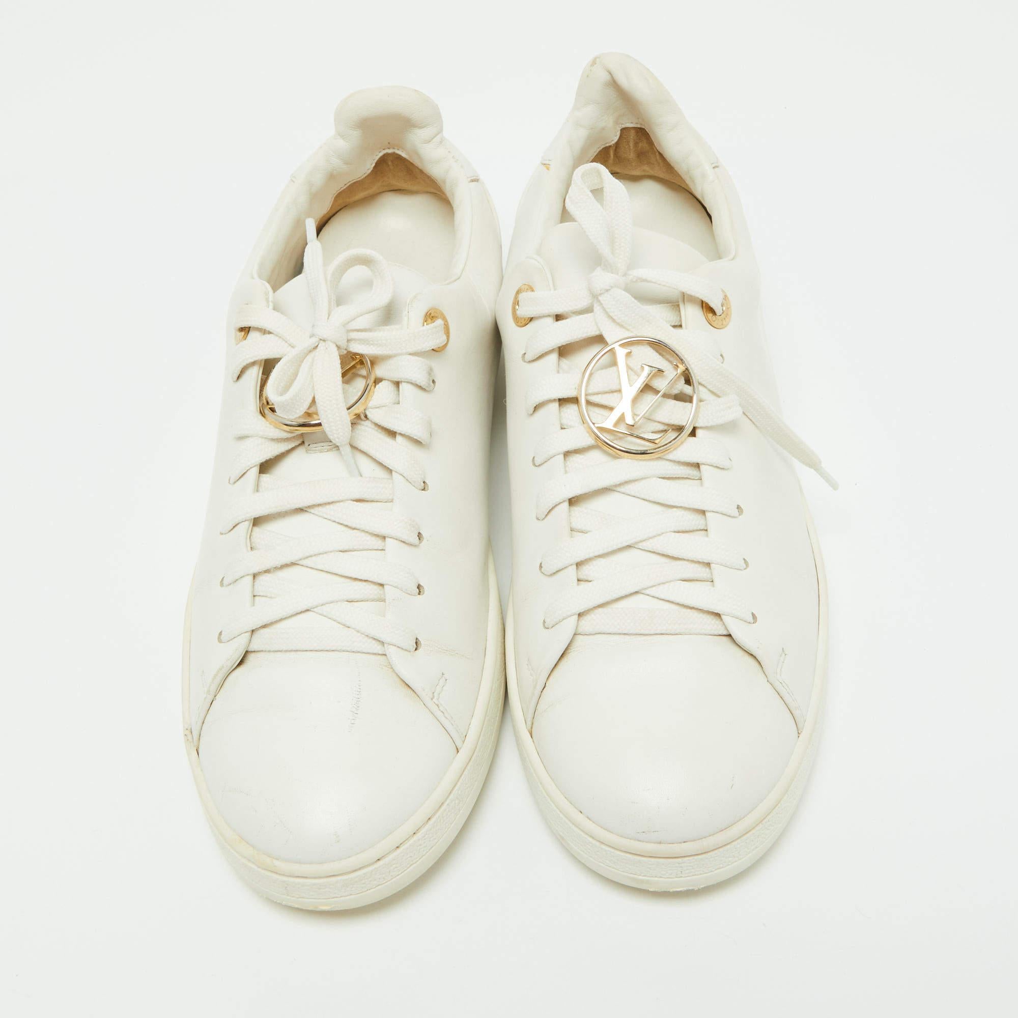 These Louis Vuitton sneakers are the ultimate step-up to bring style and attitude to your look. They are crafted from leather and have a lovely white color. They have lace-ups and durable rubber soles. They'll look super-chic with most casual