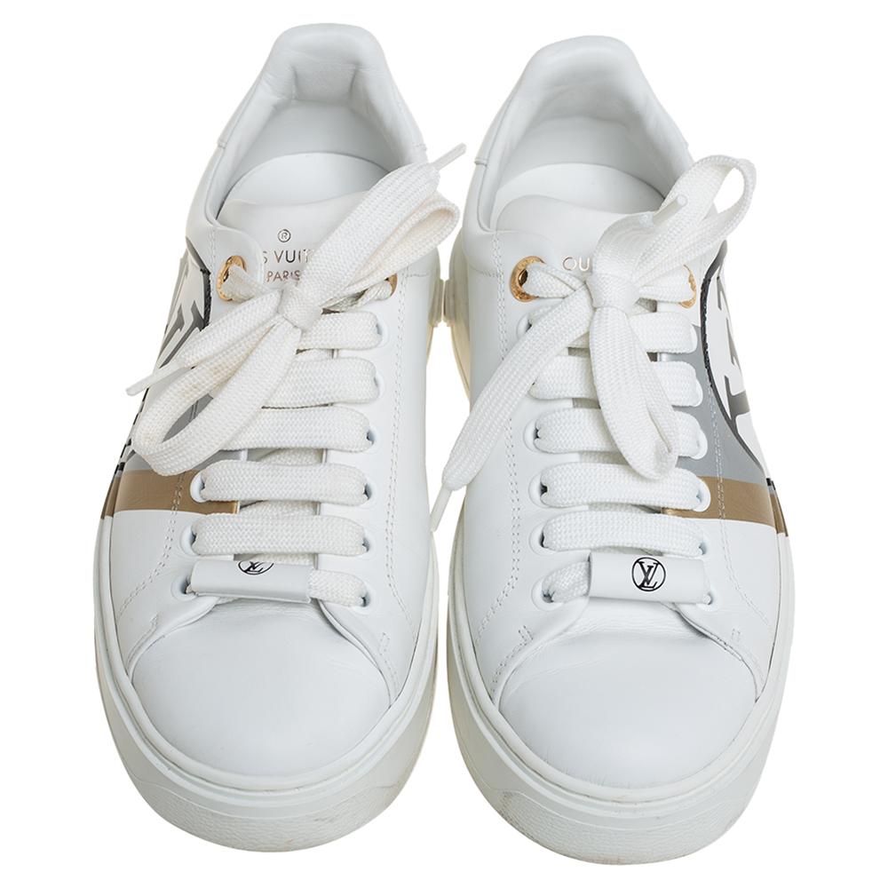 An everyday pair, you're going to love this style by Louis Vuitton. These Time Out sneakers for women are sewn in white leather and detailed with laces, the LV logo on the sides, and monogram motifs on the heels.

Includes: Original Dustbag,