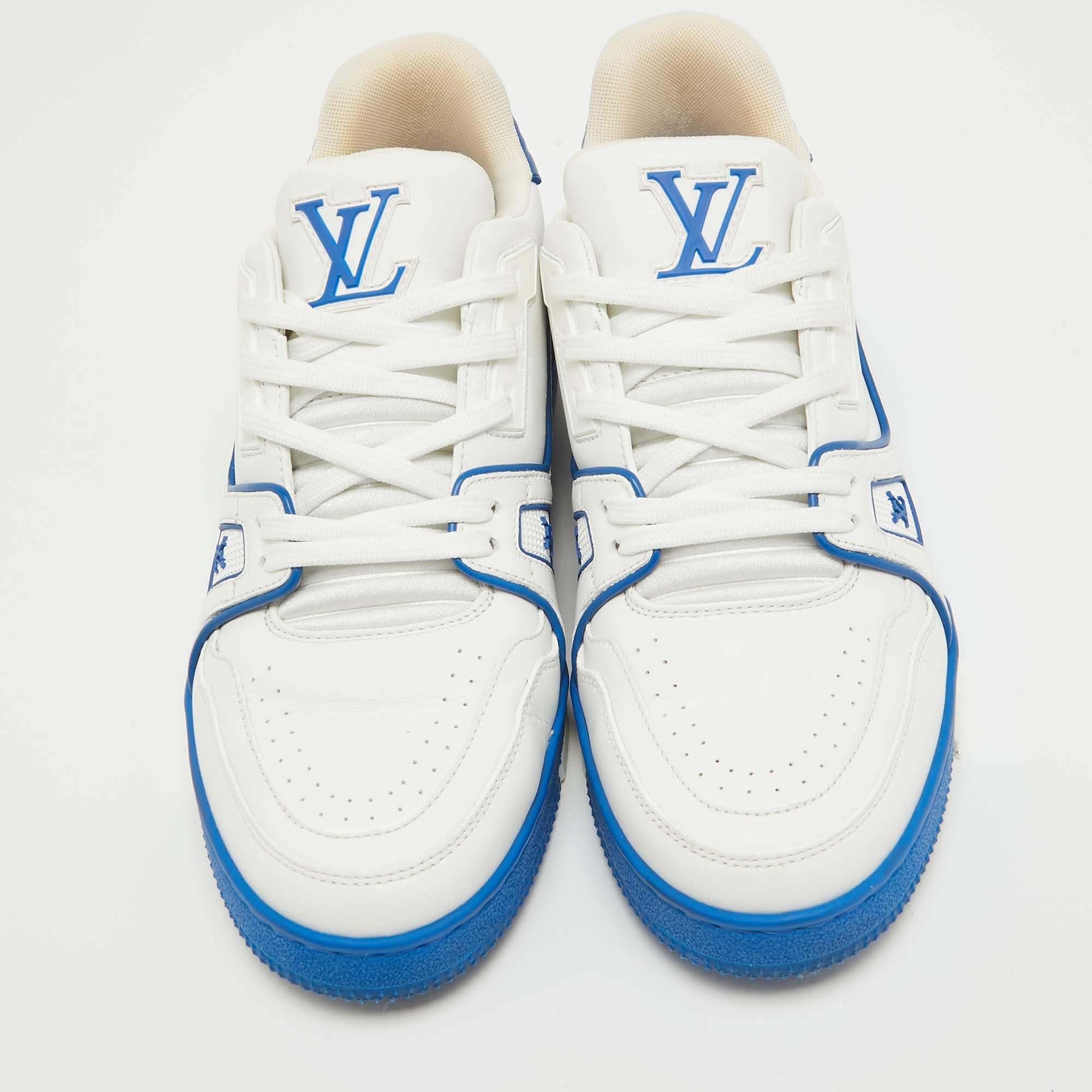 Don't miss out on making these Louis Vuitton sneakers yours this season. Crafted from leather, these white/blue sneakers feature lace-up vamps, rubber soles, and signature details.

