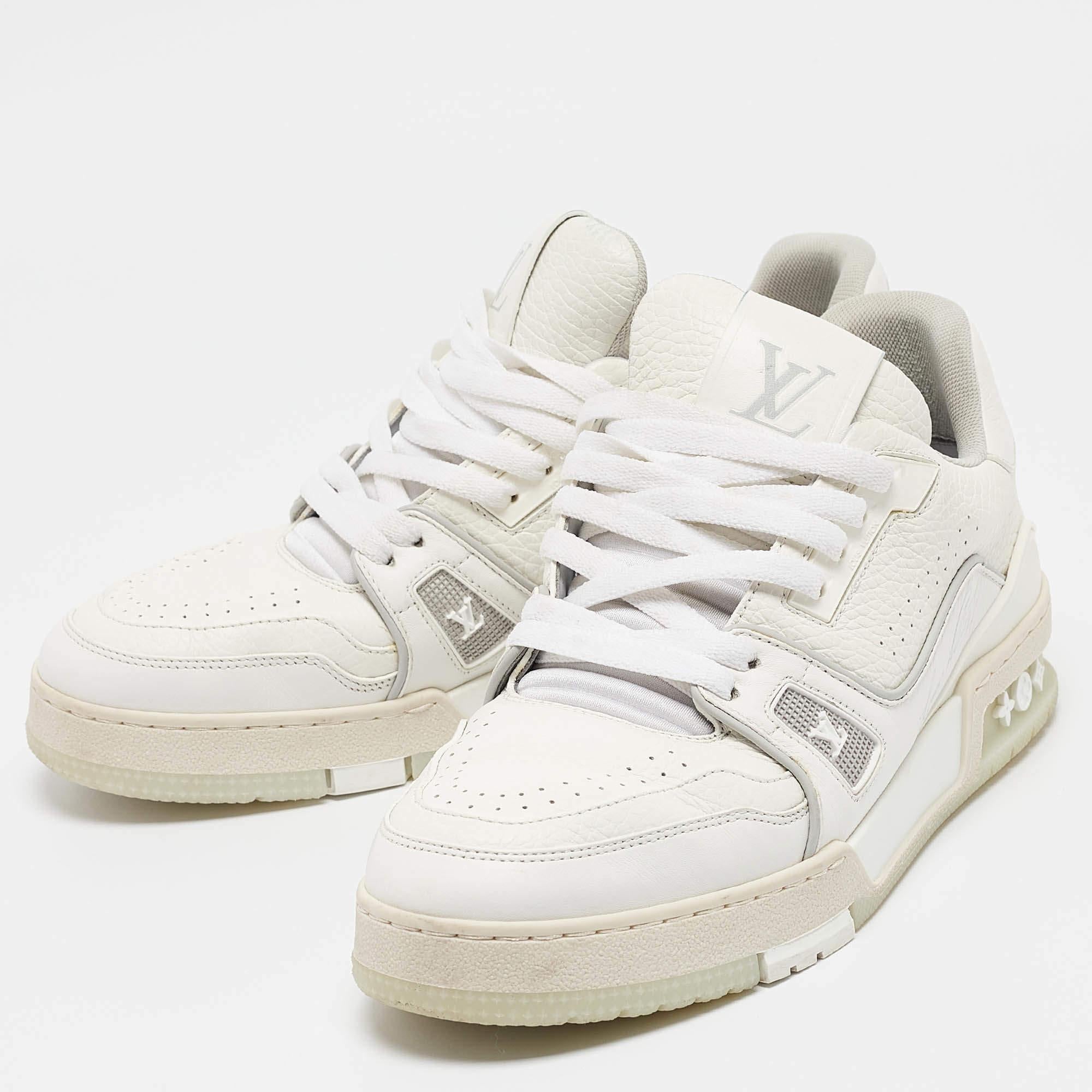 Coming in a classic silhouette  these designer sneakers are a seamless combination of luxury  comfort  and style. These sneakers are finished with signature details and comfortable insoles.
