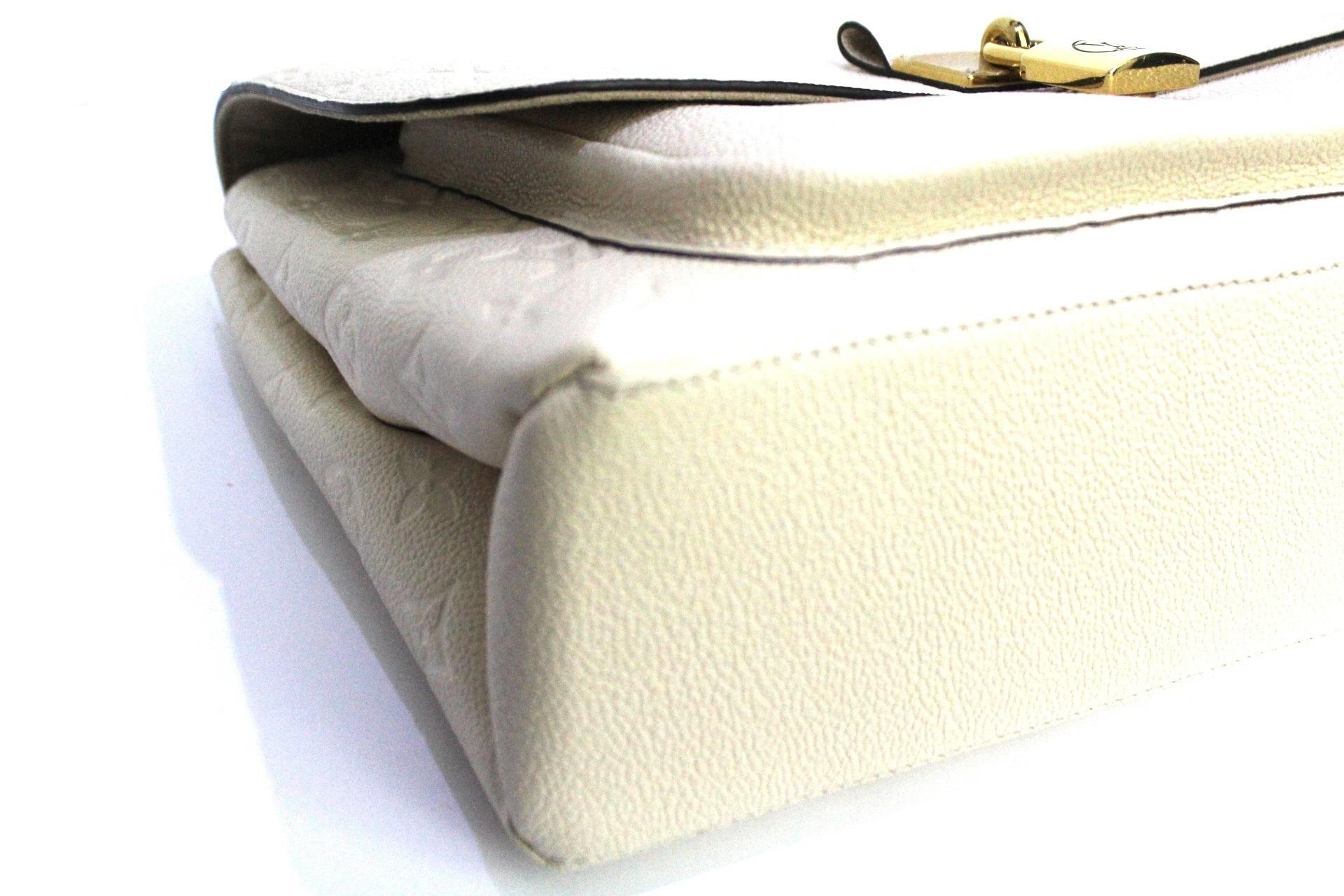 Louis Vuitton Marignan Empreinte Tasche aus weißem Leder (Weiß)