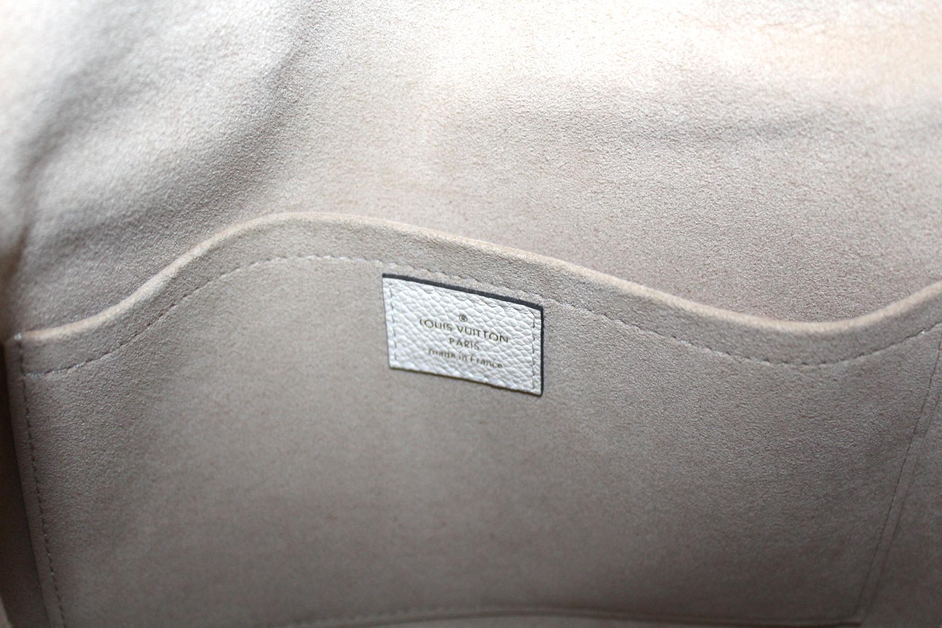 Louis Vuitton Marignan Empreinte Tasche aus weißem Leder 1