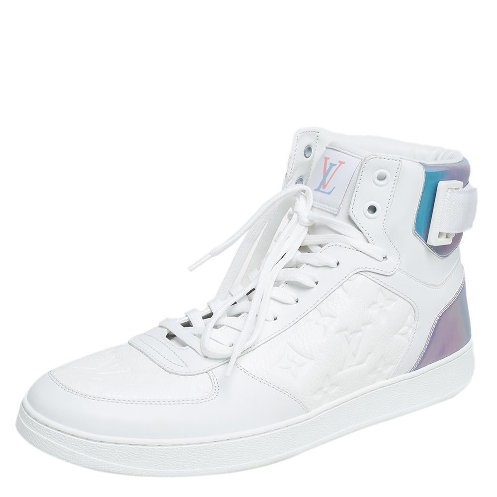 Bring home the luxurious high-fashion touch with these high-top sneakers from Louis Vuitton. Crafted from leather, these Rivoli sneakers flaunt round toes, lace-ups on the vamps, brand logo detailing on the tongues, colorful panels for extra