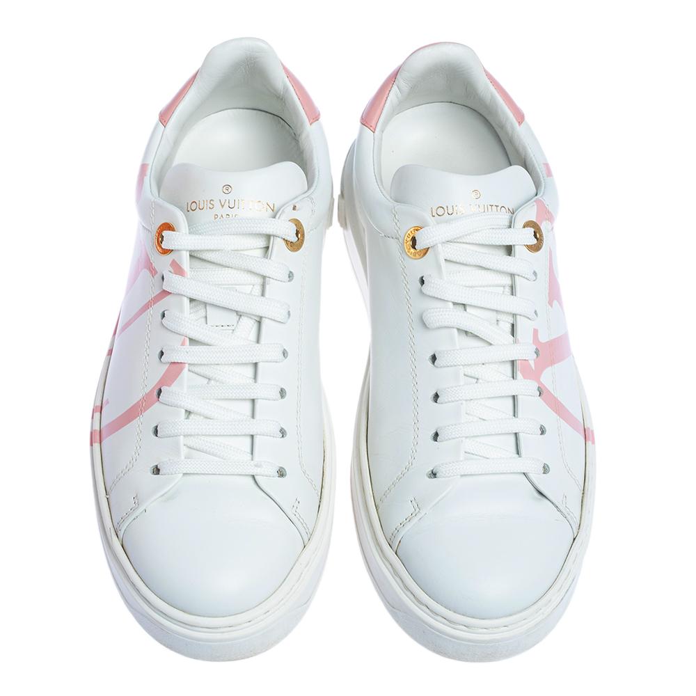 An everyday pair, you're going to love is this one by Louis Vuitton. These Time Out sneakers for women are sewn in white leather and detailed with laces, the LV logo on the sides, and monogram motifs on the heels.

Includes: Original Dustbag,