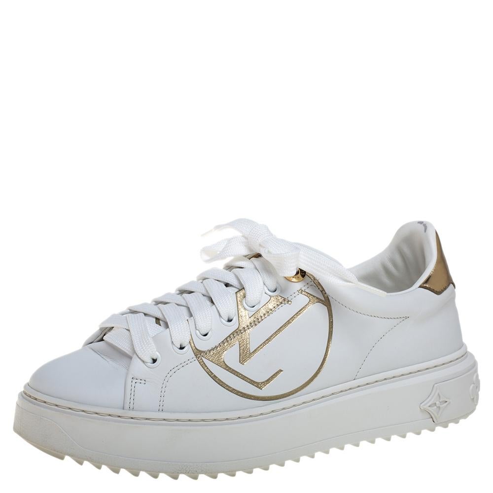 An everyday pair you're going to love is this one by Louis Vuitton. These Time Out Louis Vuitton sneakers for women are sewn in white leather and detailed with laces over the metallic LV logo and 3D monogram motifs on the heels.

Includes: Original