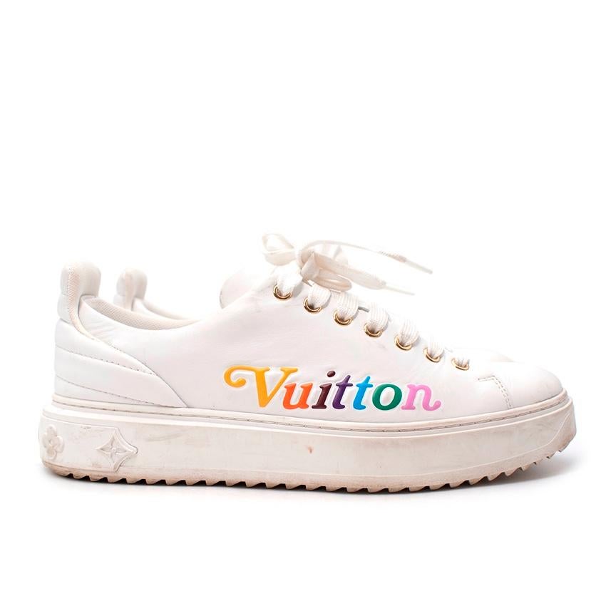 Louis Vuitton White Leather Time Out Trainers
 

 - White leather low top sneaker with platform sole
 - Debossed with a rainbow-colored Vuitton signature
 - Quilted back detail
 - Lace-up front 
 - Thick tread on the sole 
 

 Materials 
 100%