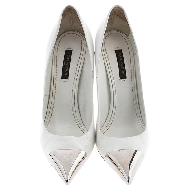 It is every woman's dream to own pumps as appealing as these Louis Vuitton ones. Crafted from leather, they come in a lovely shade of white. They are designed to deliver class and sophistication. They are styled with pointed toes with silver-tone