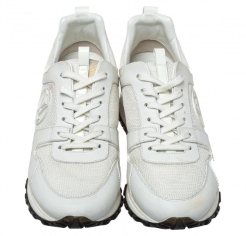 Made to provide comfort, these Louis Vuitton Run Away sneakers are trendy and stylish. They've been crafted from mesh and patent leather, leather, and designed with lace-up vamps and the label's monogram motifs on the sides. Wear them with your