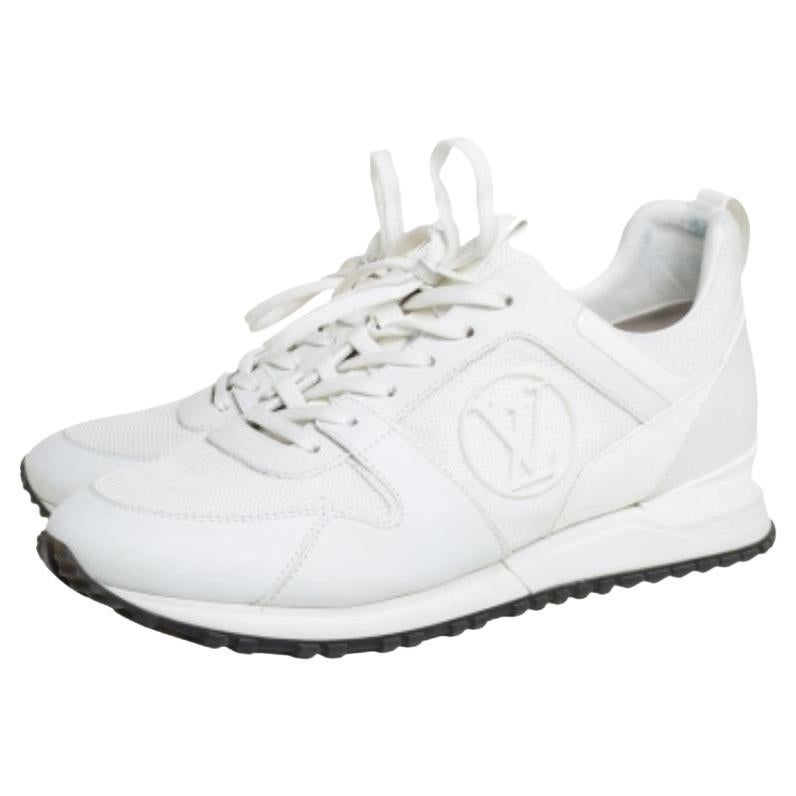 Made to provide comfort, these Louis Vuitton Run Away sneakers are trendy and stylish. They've been crafted from mesh and patent leather, leather, and designed with lace-up vamps and the label's monogram motifs on the sides. Wear them with your