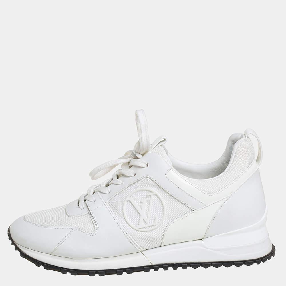 Made to provide comfort, these Louis Vuitton Run Away sneakers are trendy and stylish. They've been crafted from mesh and patent leather, leather, and designed with lace-up vamps and the label's monogram motifs on the sides. Wear them with your